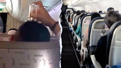 Passenger's bizarre use of drinking glass on flight leaves travelers horrified Melbourne Accountant